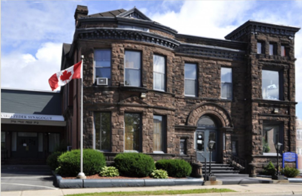 The Saint John Jewish Historical Museum, a large Victorian stone mansion with a prominent corner tower