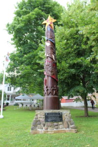 The History Tree of Acadians, a wooden five-metre totem pole decorated by images related to Acadian history